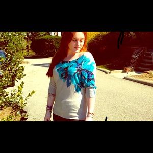 Beautifully black sequined teal flower top